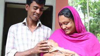 Babar and his wife with their daughter Tayeba when she was a baby.