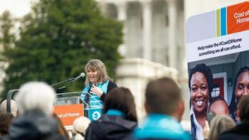 Juanita speaking to a crowd at Habitat on the Hill.