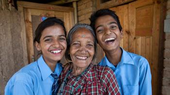 Ganga Devi (center) with her twin grandchildren Aayush (left) and Sadhan in her home in Kavre rebuilt after 2015 Nepal earthquake