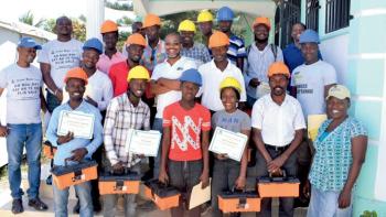 A group of trainees stand together.