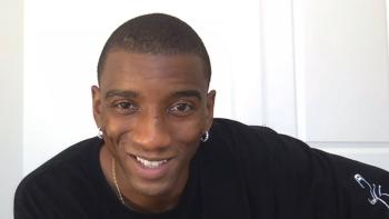 Malcolm Mitchell smiling and talking.