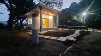 A house with white pillars in front.