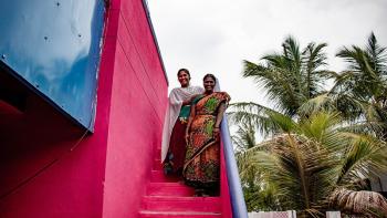 Mahadevi (right) and her daughter Praveena at the steps of their house in southern India
