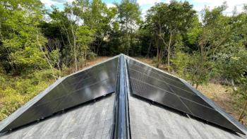 A set of solar panels on a roof.
