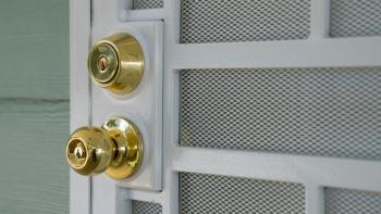 A close-up on a golden door knob.