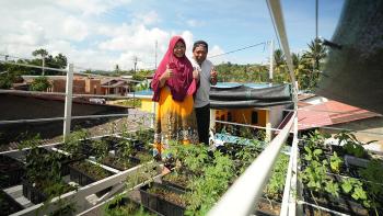 Kartina and her husband Muhaeni at their rooftop garden in Batam, Indonesia