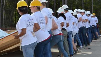 Row of volunteers on build site
