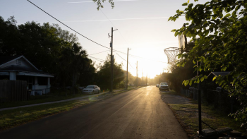The street where new homes are being built by Habitat For Humanity of Jacksonville is illuminated by the early morning light. 