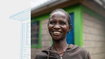 A woman stands in front of her home, with one edge of the house rendered as lineart.