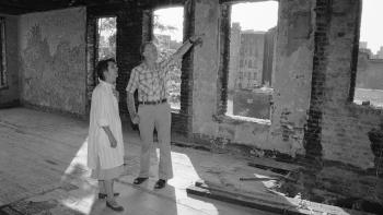 The Carters standing in a home.