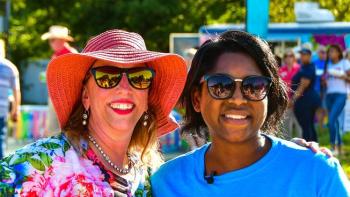 Two women smiling