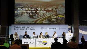 panel of speakers at a conference