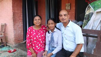 Jodu (right) with his wife Sita (left) and daughter Tenisha at their Nepal home