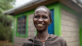 Woman in Kenya smiling for a photo