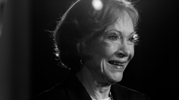 black and white close-up portrait of Rosalynn Carter smiling.