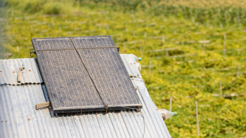 Small solar panel on a tin roof