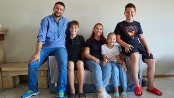 Ukrainian family in their apartment in Poland