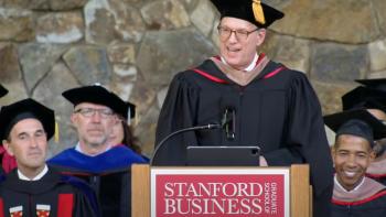 Jonathan Reckford at podium giving Stanford graduation keynote address