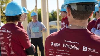 Whirlpool volunteers on build site