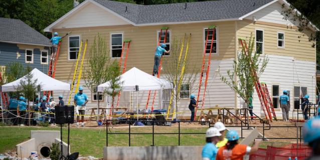 Volunteers had 1 week. They built 24 homes. Carter Work Project returns to Atlanta after 40 years
