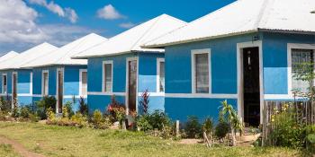 Row of blue Habitat houses, Philippines