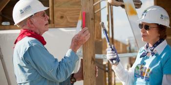 Jimmy and Rosalynn Carter building with Habitat.