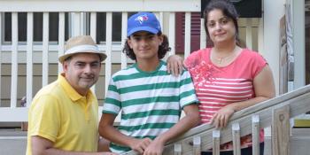 Des Moines homeowner family in front of house