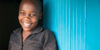 Homeowner, blue door, Kenya