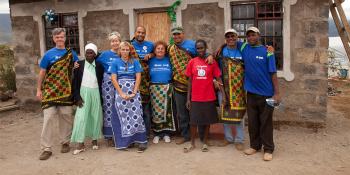 Homeowner with volunteer group.