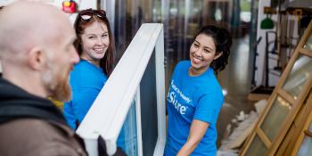A customer donates goods to Habitat ReStore
