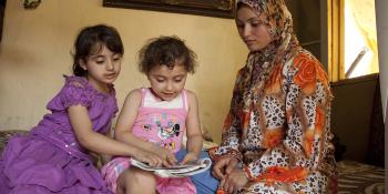 two-girls-and-mother-reading-together-lebanon-flat