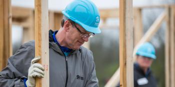 Habitat CEO Jonathan Reckford helps raise walls in Nashville, Tennessee