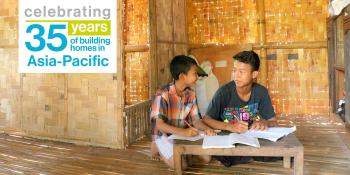 Phon Pyae Han (right), 15, and Pyae Sone Maung, 9, live in a Habitat bamboo home in Myanmar