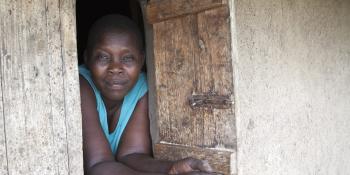 Photo: a woman looking out of the window