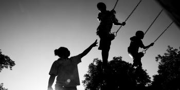 Children swinging.
