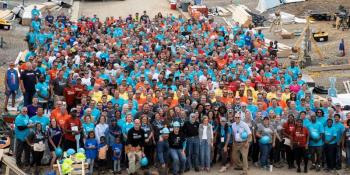 Group photo of volunteers with President and Mrs. Carter.