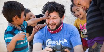 Volunteer with kids.