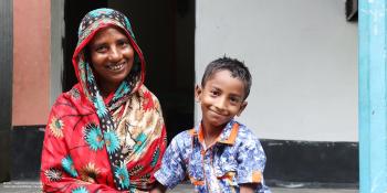 Samala and her son Aminul at the porch of their house in Charpara village, north-central Bangladesh