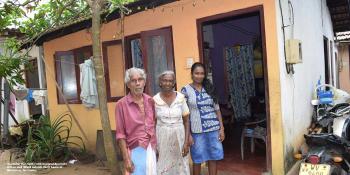 Arthur, Silard and their granddaughter Shashika outside their house in Moratuwa, Sri Lanka
