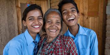 Ganga Devi (center) with her twin grandchildren Aayush (left) and Sadhan in her home in Kavre rebuilt after 2015 Nepal earthquake