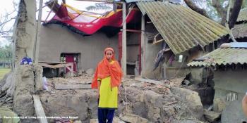 A woman whose house was destroyed by Cyclone Amphan in West Bengal, India