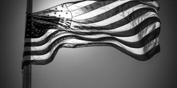 Black and white photo of an American flag.