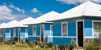 A row of blue houses in the Philippines. 