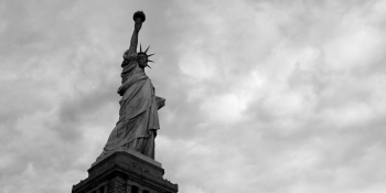 Black and white photo of the Statue of Liberty.