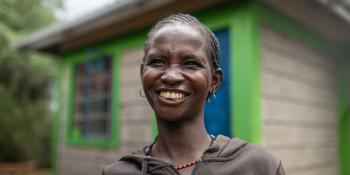 Woman in Kenya smiling for a photo