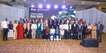 Groupf photo of delegates in a meeting