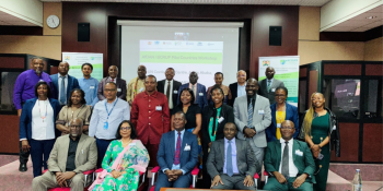 Groupf photo of delegates in a meeting