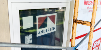 Closeup of Anderson logo on a window on a construction site