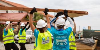 Habitat for Humanity volunteers building a house
