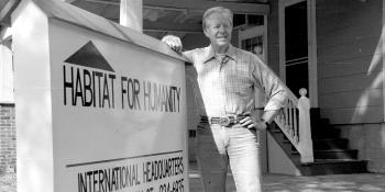 Jimmy Carter with Habitat sign
